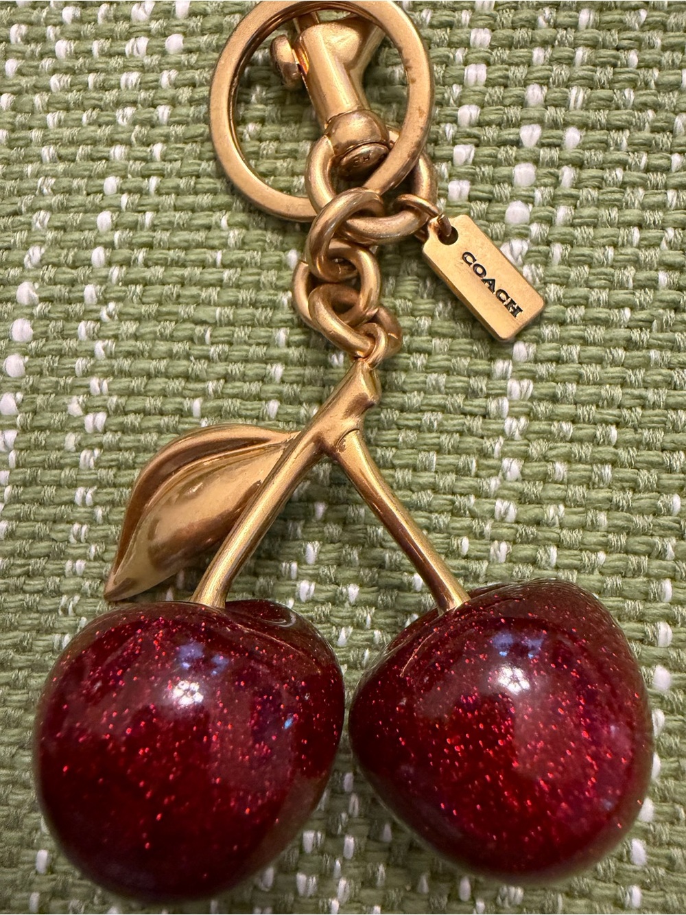 Coach Gold-Tone Red Glitter Cherry Charm Bracelet Accent